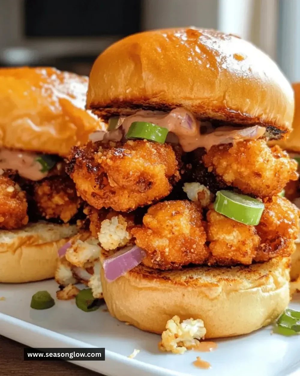 Delicious crispy cauliflower sliders served on a plate