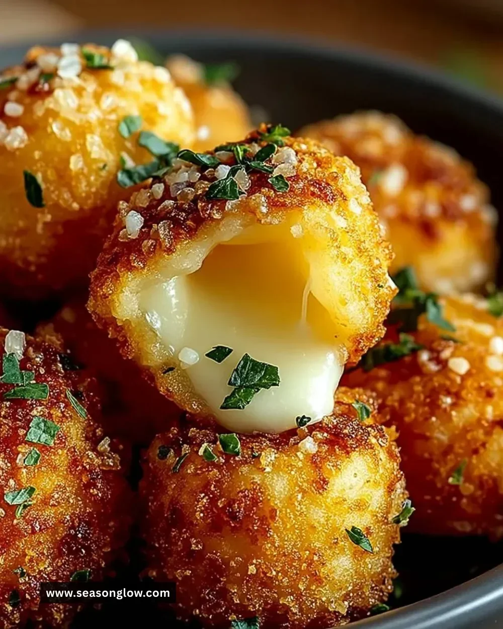 Deliciously cheesy mozzarella parmesan bites served as a snack or appetizer.