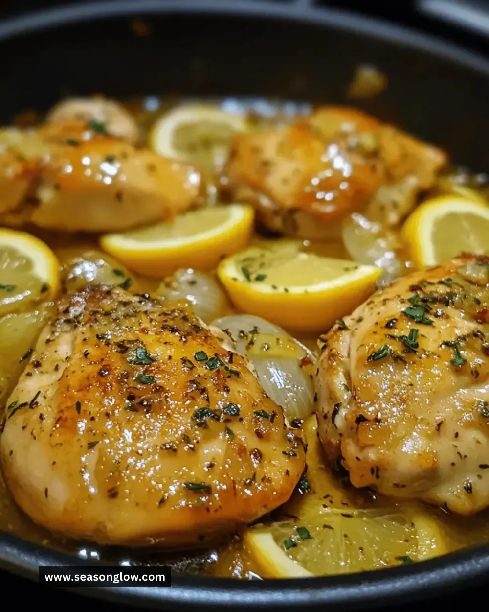 Easy one-pan lemon garlic chicken dish garnished with herbs