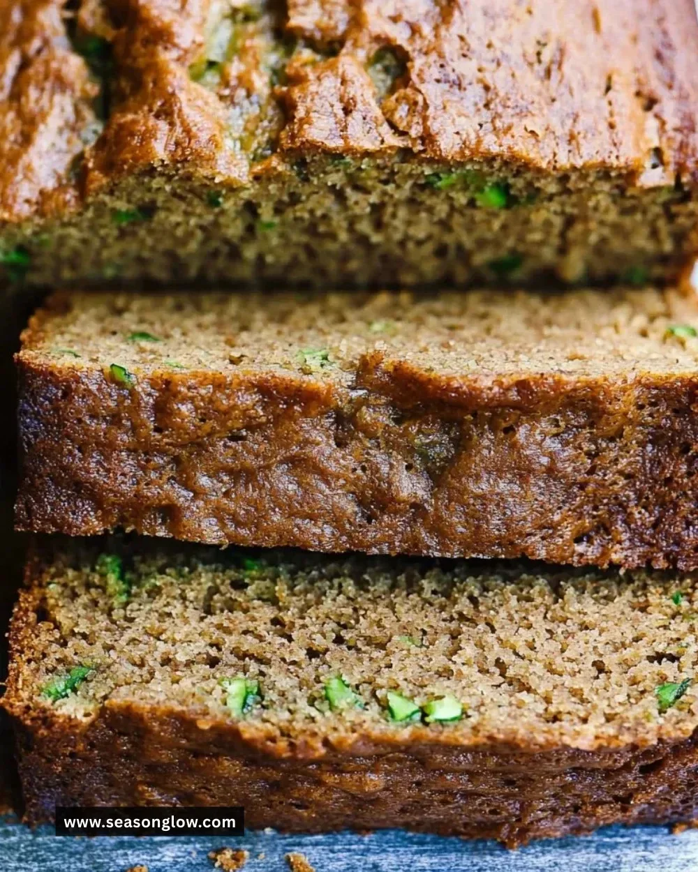 Slice of healthy zucchini bread on a wooden board