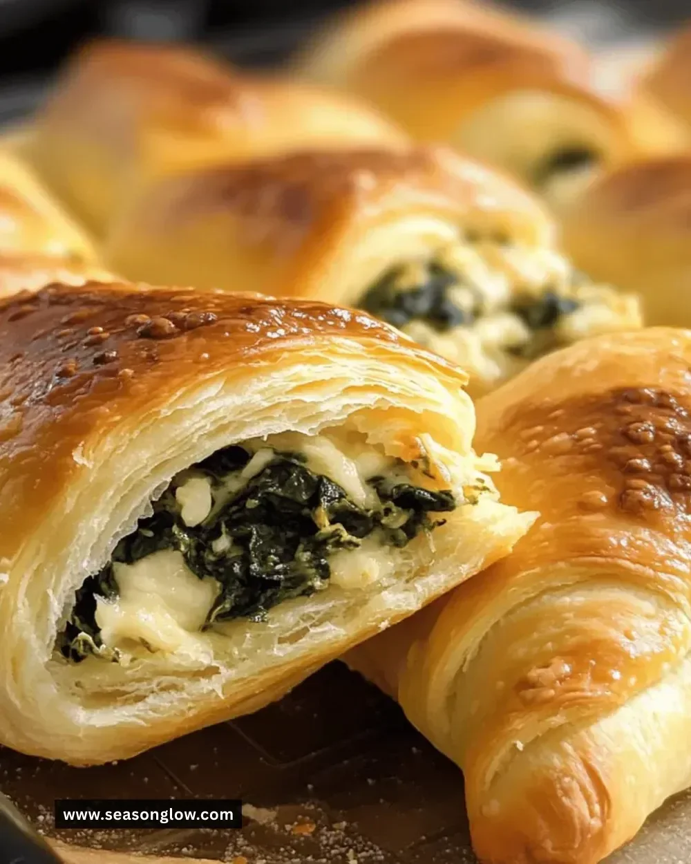 Delicious cheesy spinach stuffed crescent rolls ready to serve