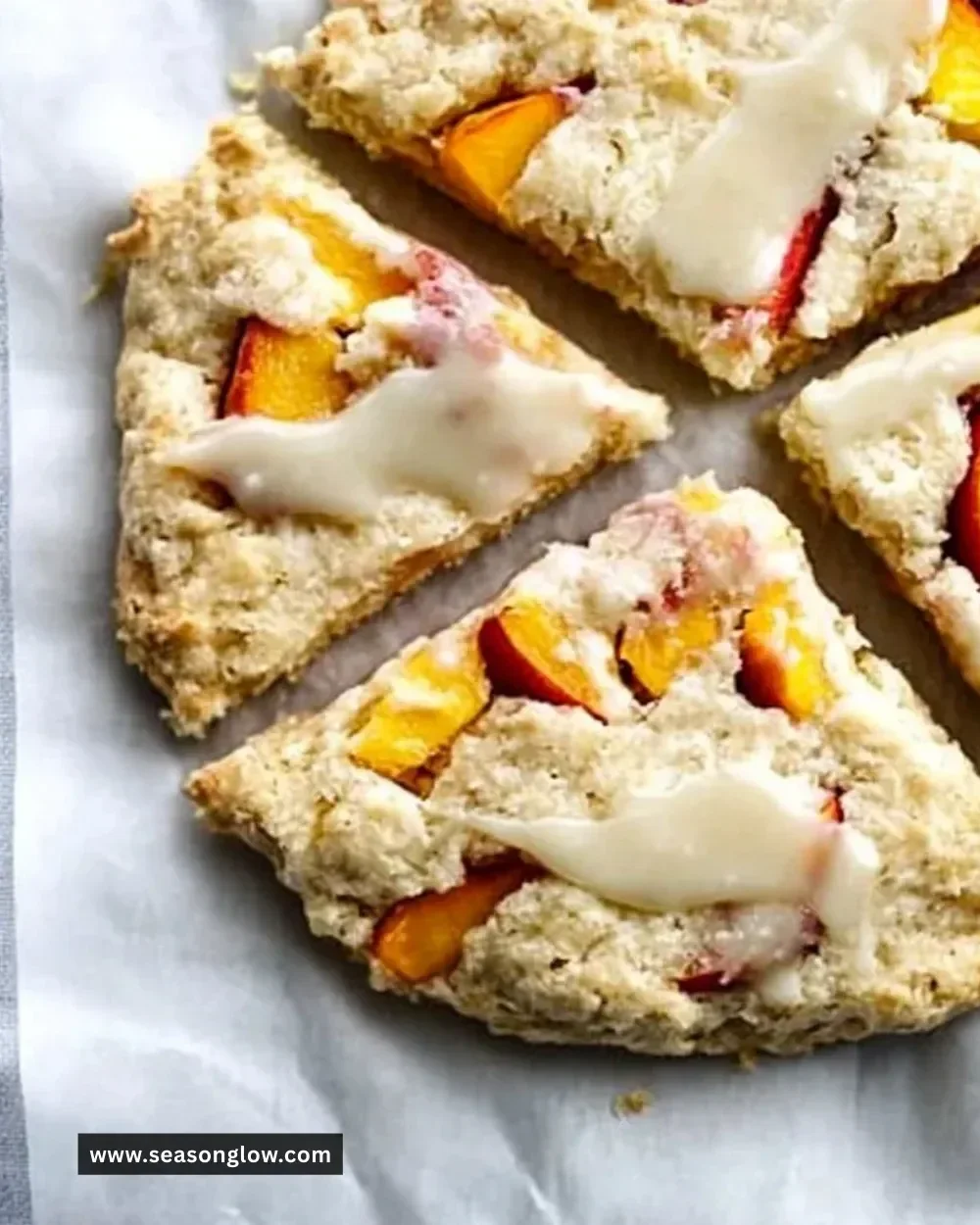 Freshly baked peach scones drizzled with honey vanilla glaze