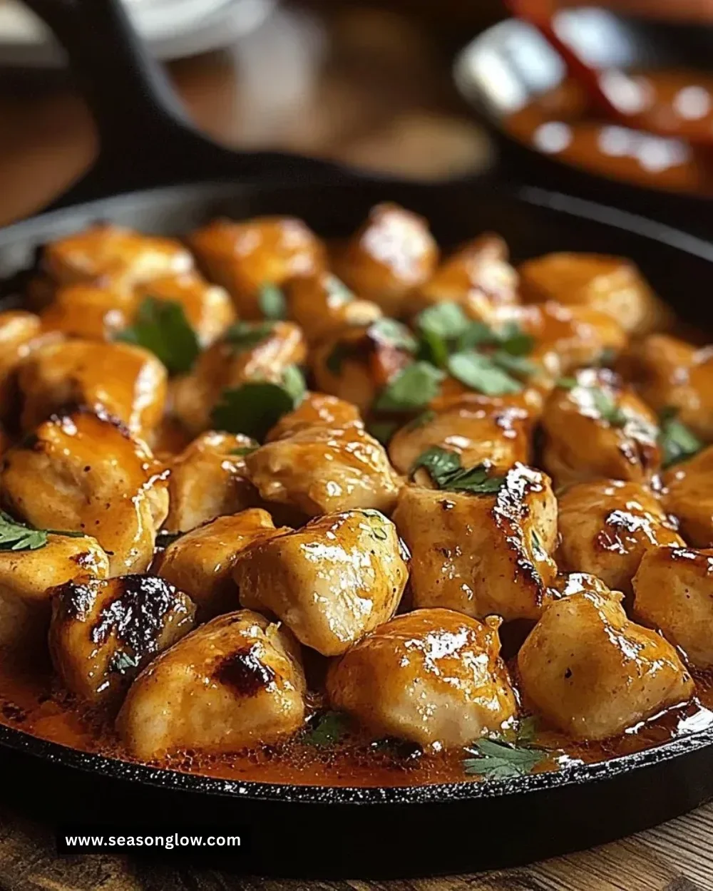 Texas Roadhouse butter chicken skillet topped with herbs and spices