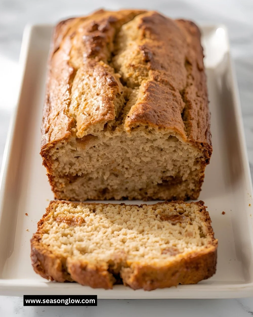 Freshly baked apple bread with chunks of apple and a golden crust