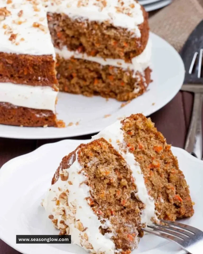 Delicious carrot cake with luscious cream cheese frosting on a rustic wooden table