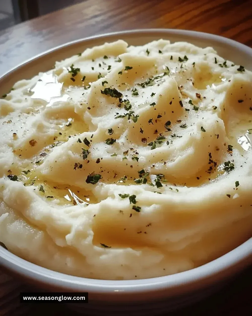 Delicious creamy garlic mashed potatoes served in a bowl.