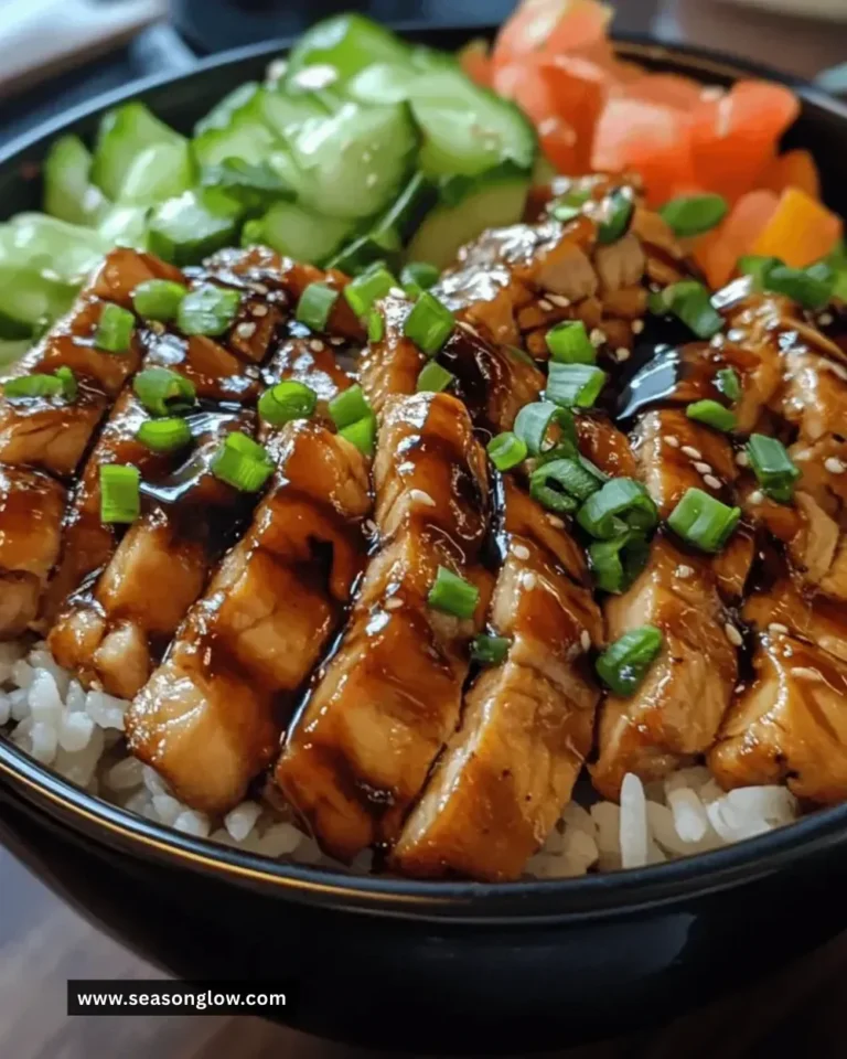 Delicious teriyaki chicken rice bowl topped with colorful vegetables