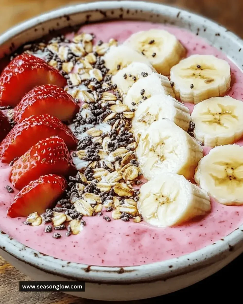Best strawberry banana smoothie bowl topped with fresh fruits and granola