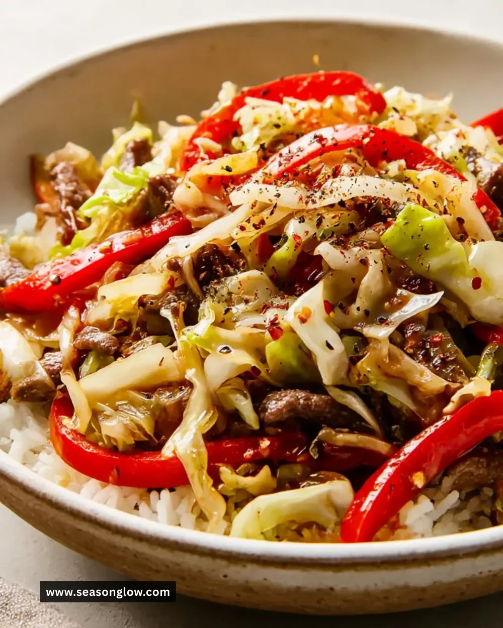 Black Pepper Beef and Cabbage Stir-Fry served on a plate