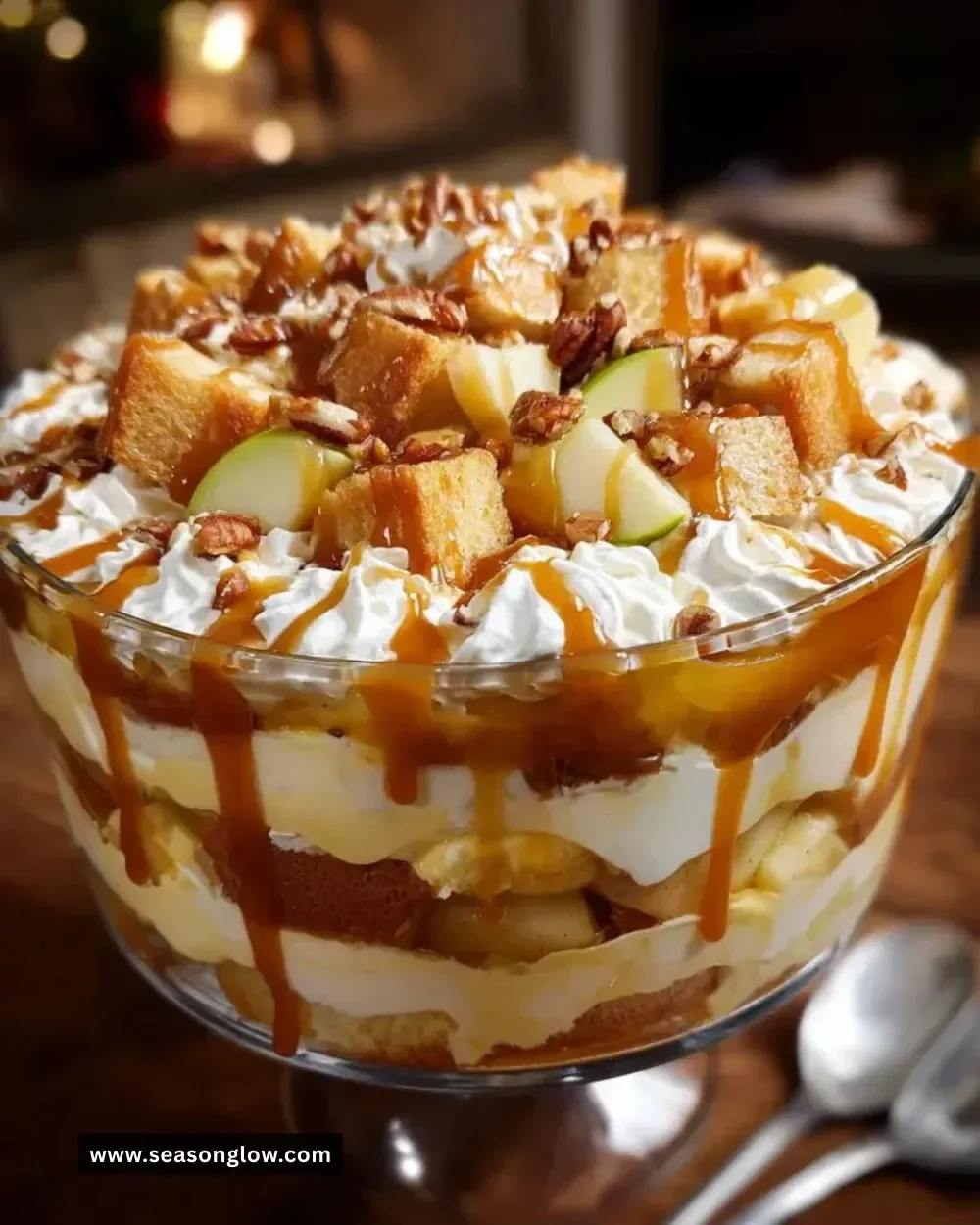 Delicious caramel apple trifle with layers of caramel, apples, and whipped cream.