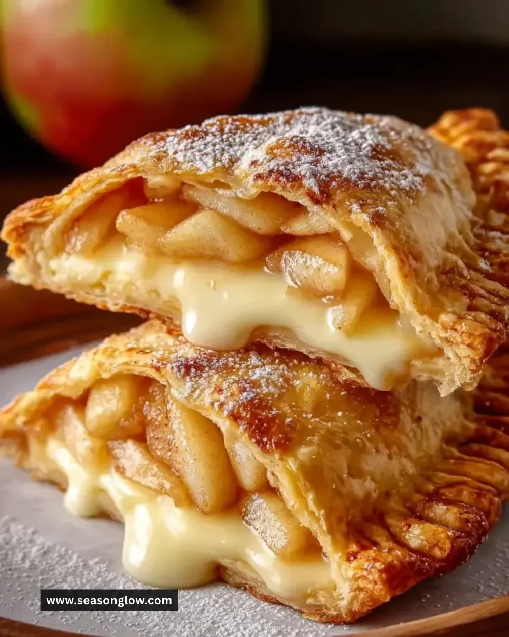 Delicious cheesecake stuffed apple pies with a flaky crust and apple filling.