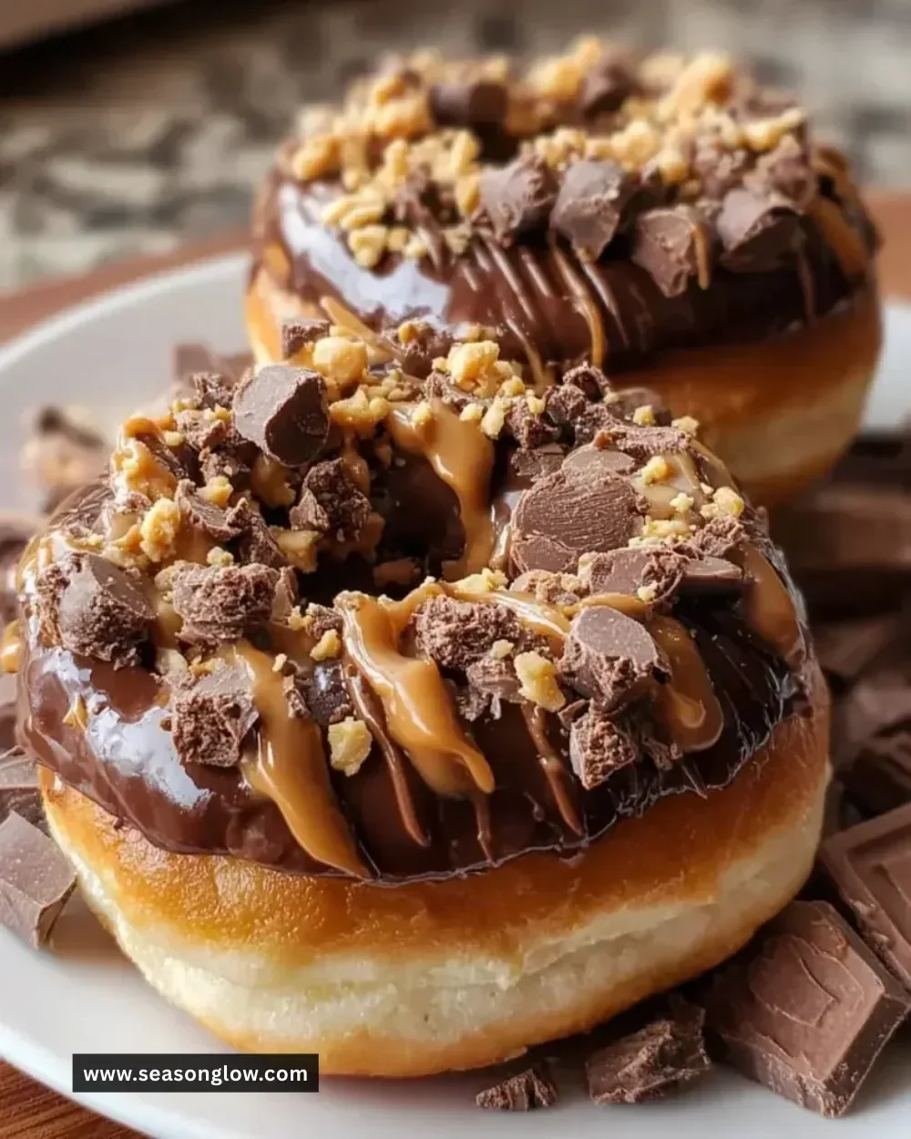 Delicious chocolate peanut butter cup stuffed donuts on a plate