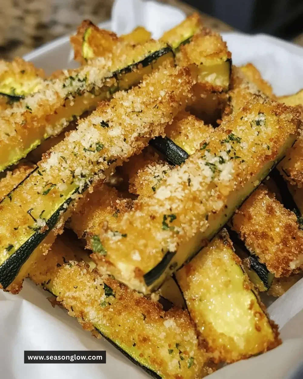 Crispy zucchini Parmesan fries served with dipping sauce