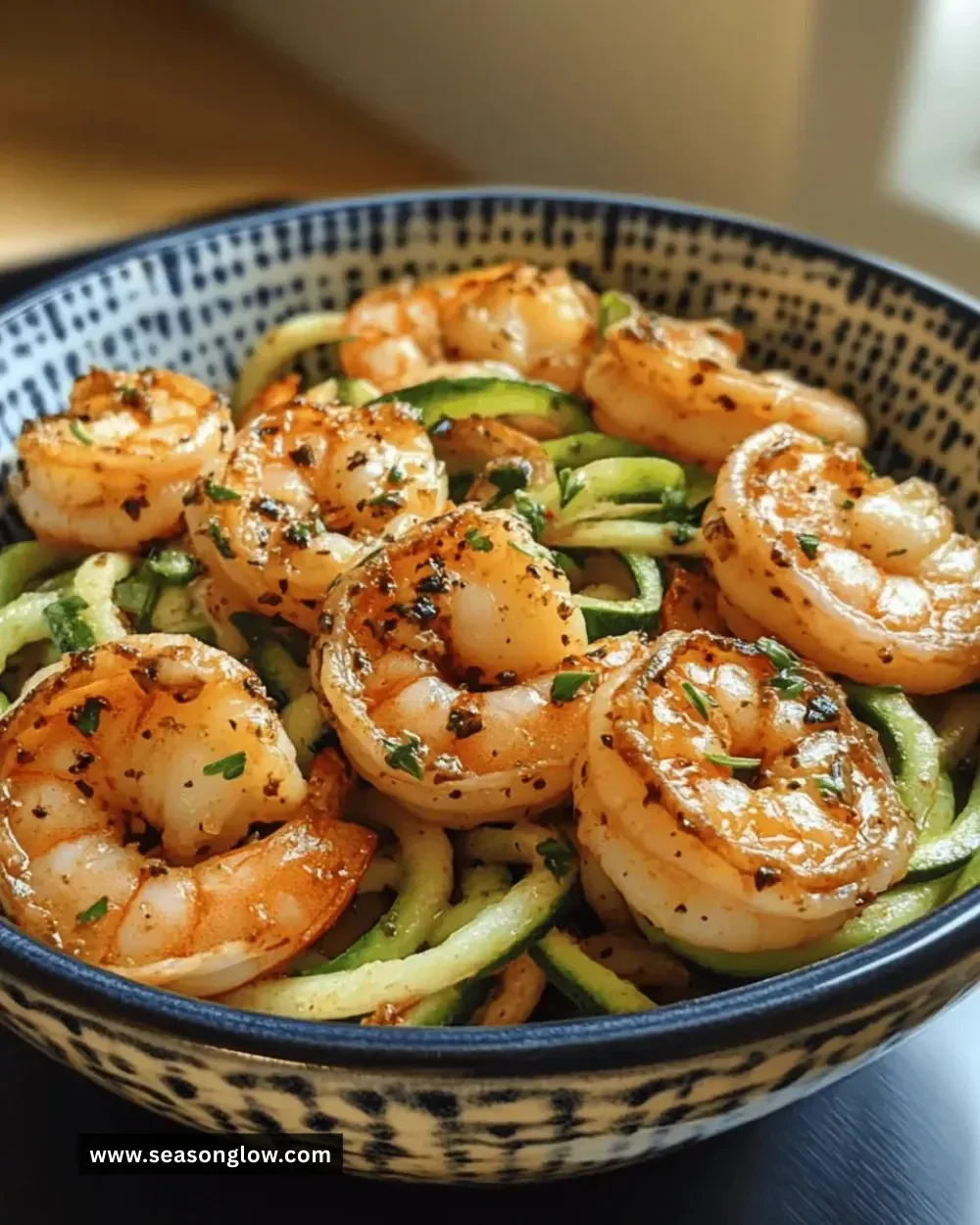 Delicious garlic shrimp served with zoodles in a bowl