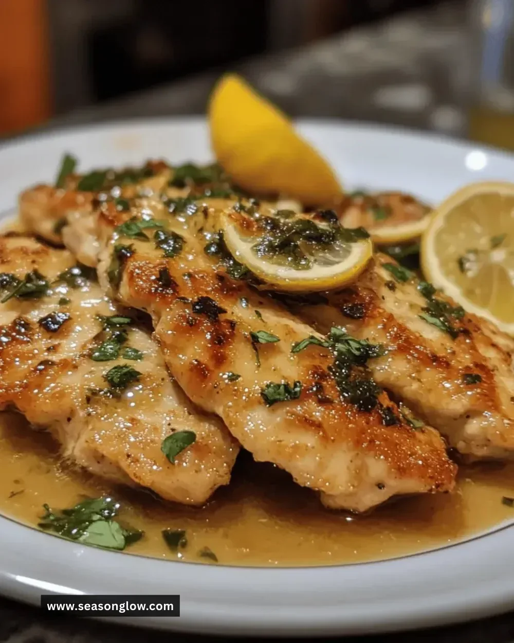 Easy juicy chicken piccata served with lemon and capers