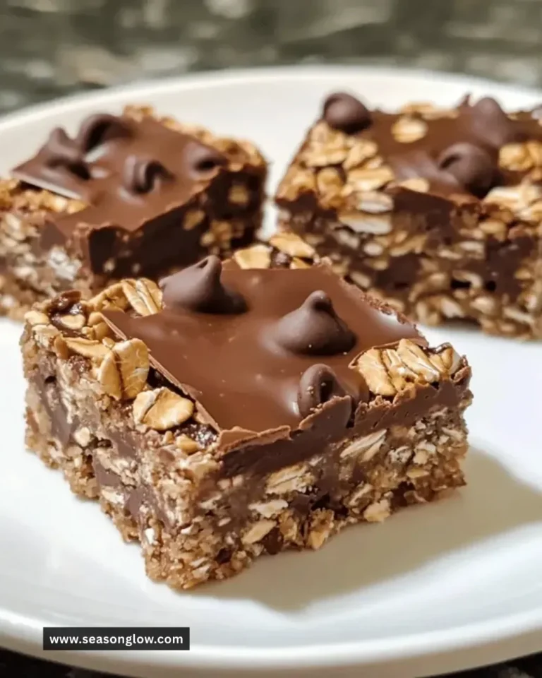 Delicious no-bake chocolate oat bars stacked on a plate