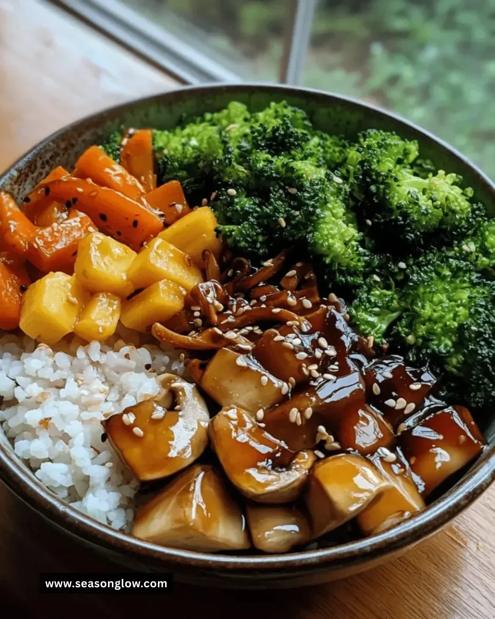 Colorful teriyaki veggie bowl topped with fresh vegetables and sesame seeds