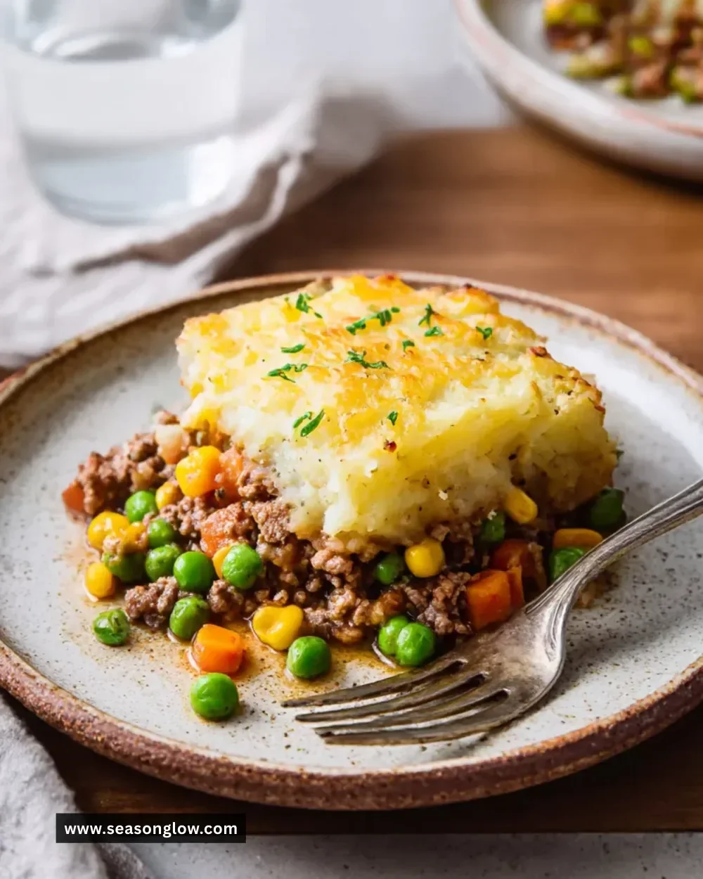 Delicious easy Shepherd’s Pie topped with golden mashed potatoes