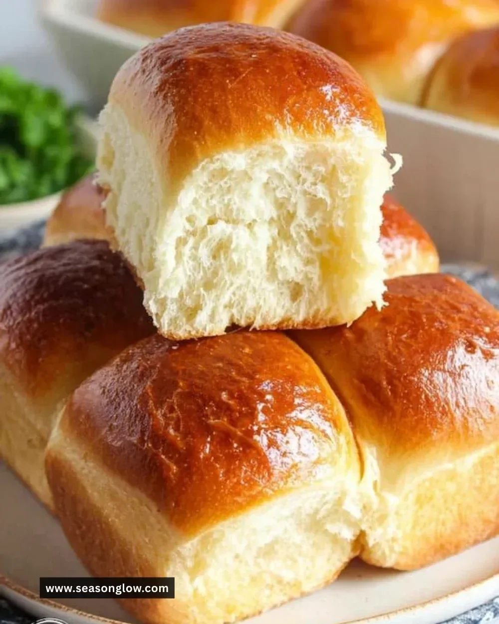 Freshly baked homemade dinner rolls served warm.