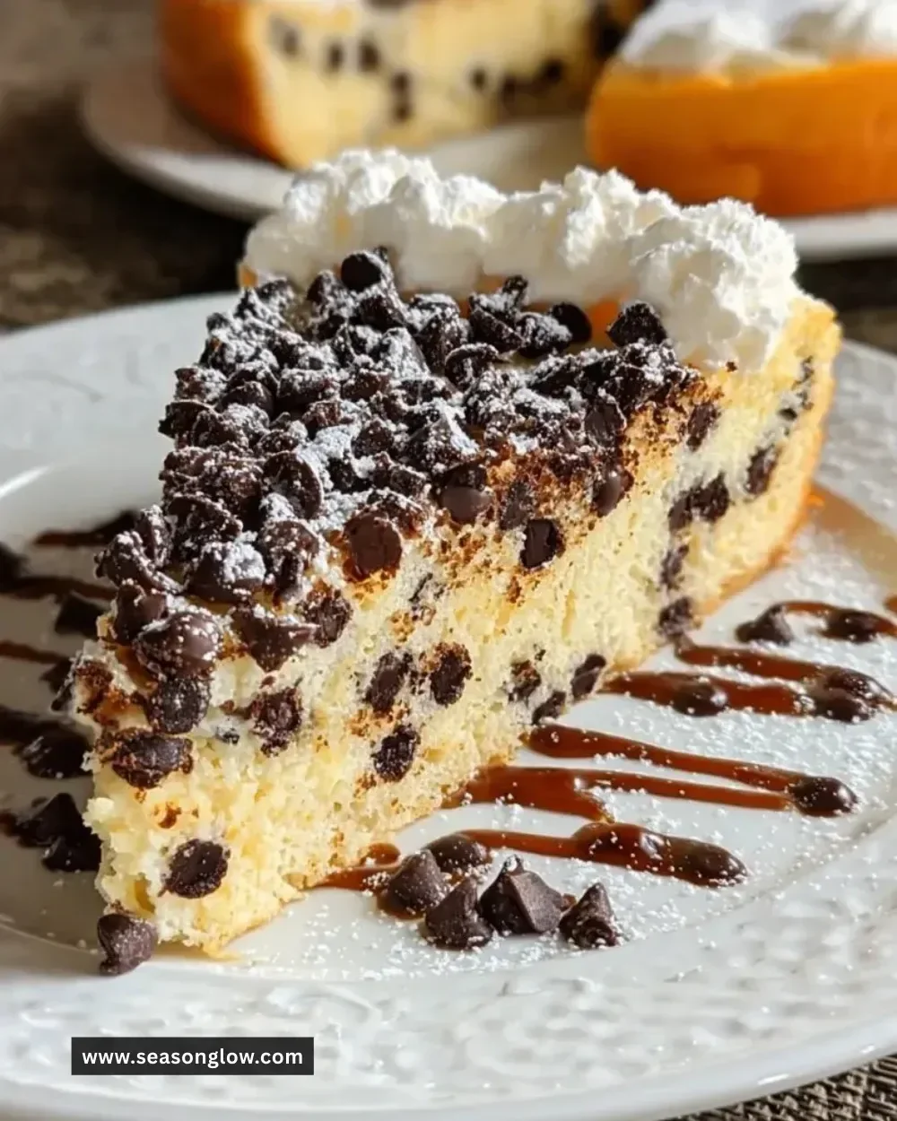 Slice of Italian Chocolate Chip Ricotta Cake on a plate with chocolate chips