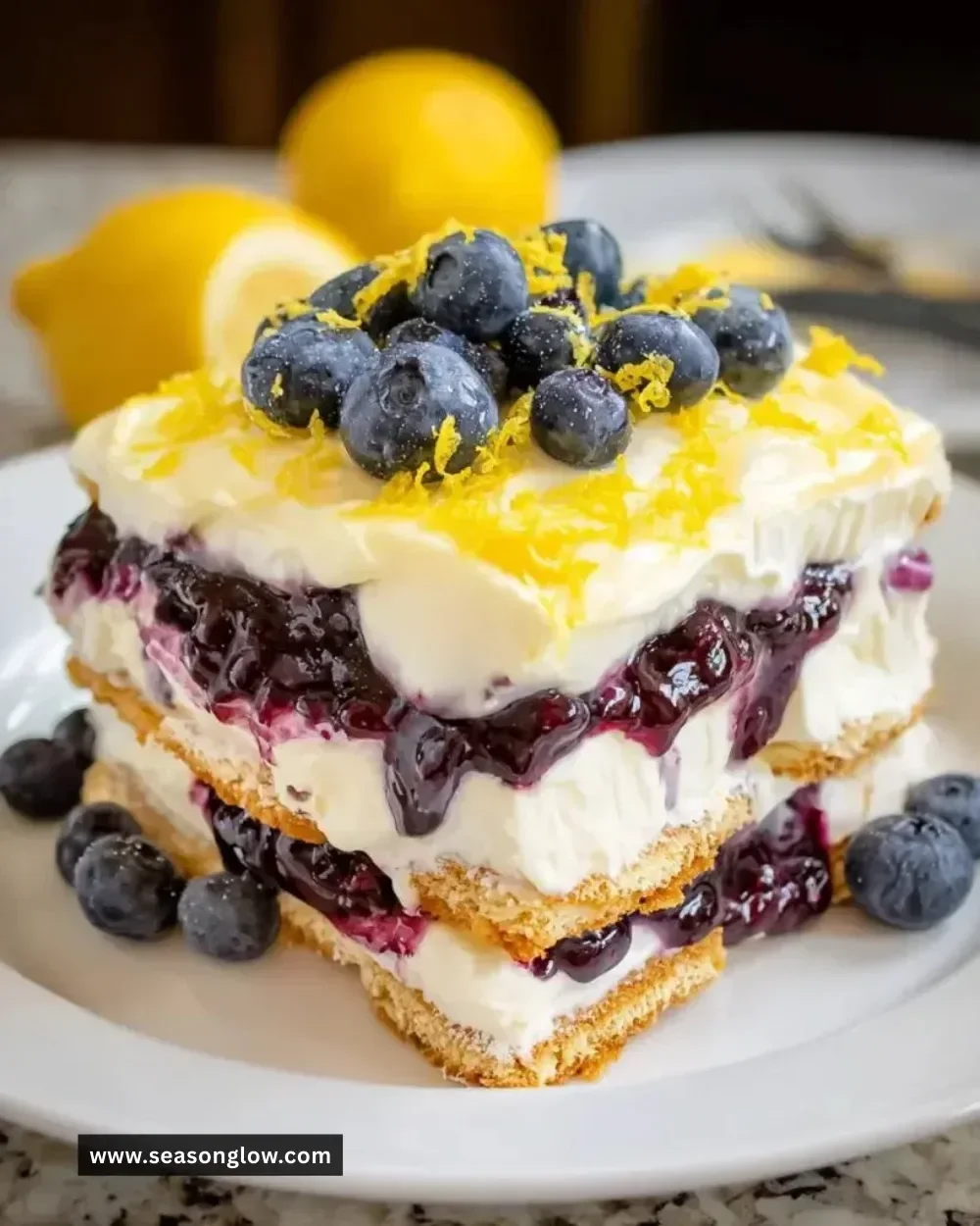 Lemon Blueberry Icebox Cake layered with creamy filling and fresh blueberries.