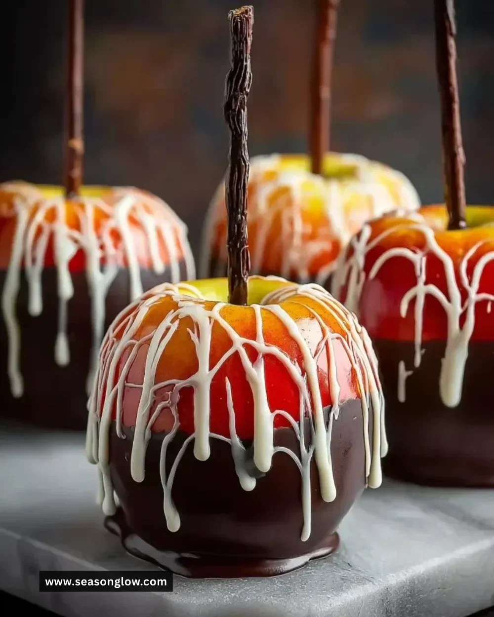 Marshmallow dipped apples on a plate, perfect for a sweet treat.