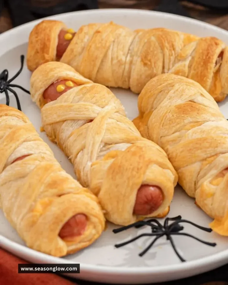 Mummy Hot Dogs wrapped in flaky pastry for Halloween