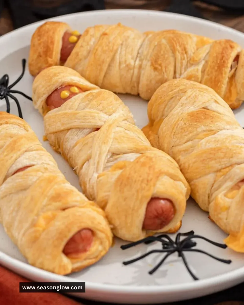 Mummy Hot Dogs wrapped in flaky pastry for Halloween