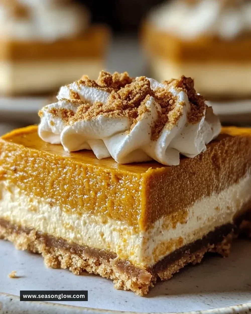 No Bake Pumpkin Cheesecake Bars with a rich pumpkin filling and graham cracker crust