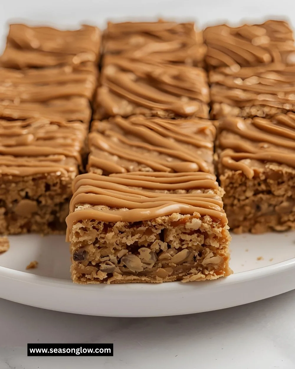 Homemade Oatmeal Peanut Butter Bars on a wooden table