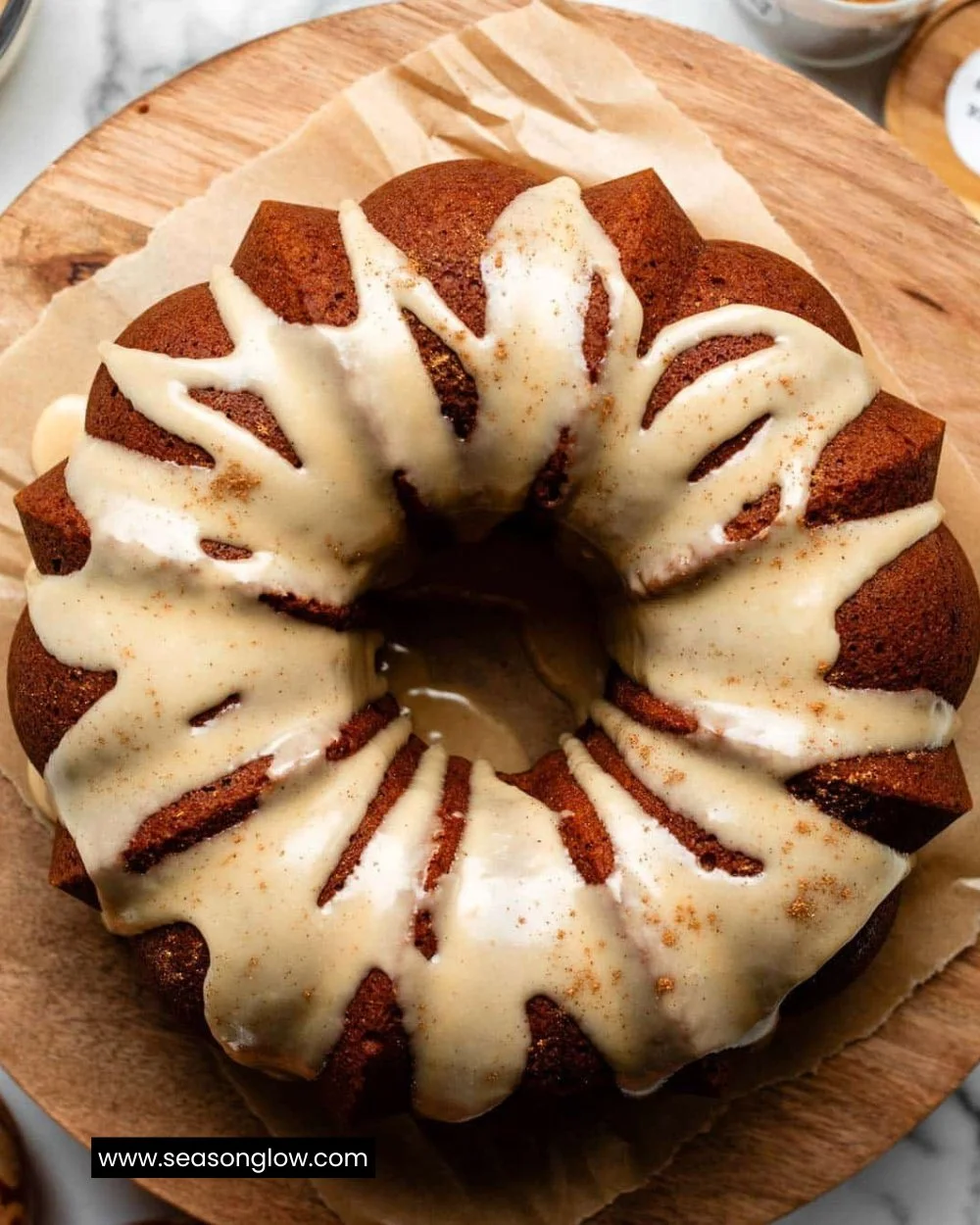 Delicious homemade Pumpkin Bundt Cake topped with creamy glaze and spices