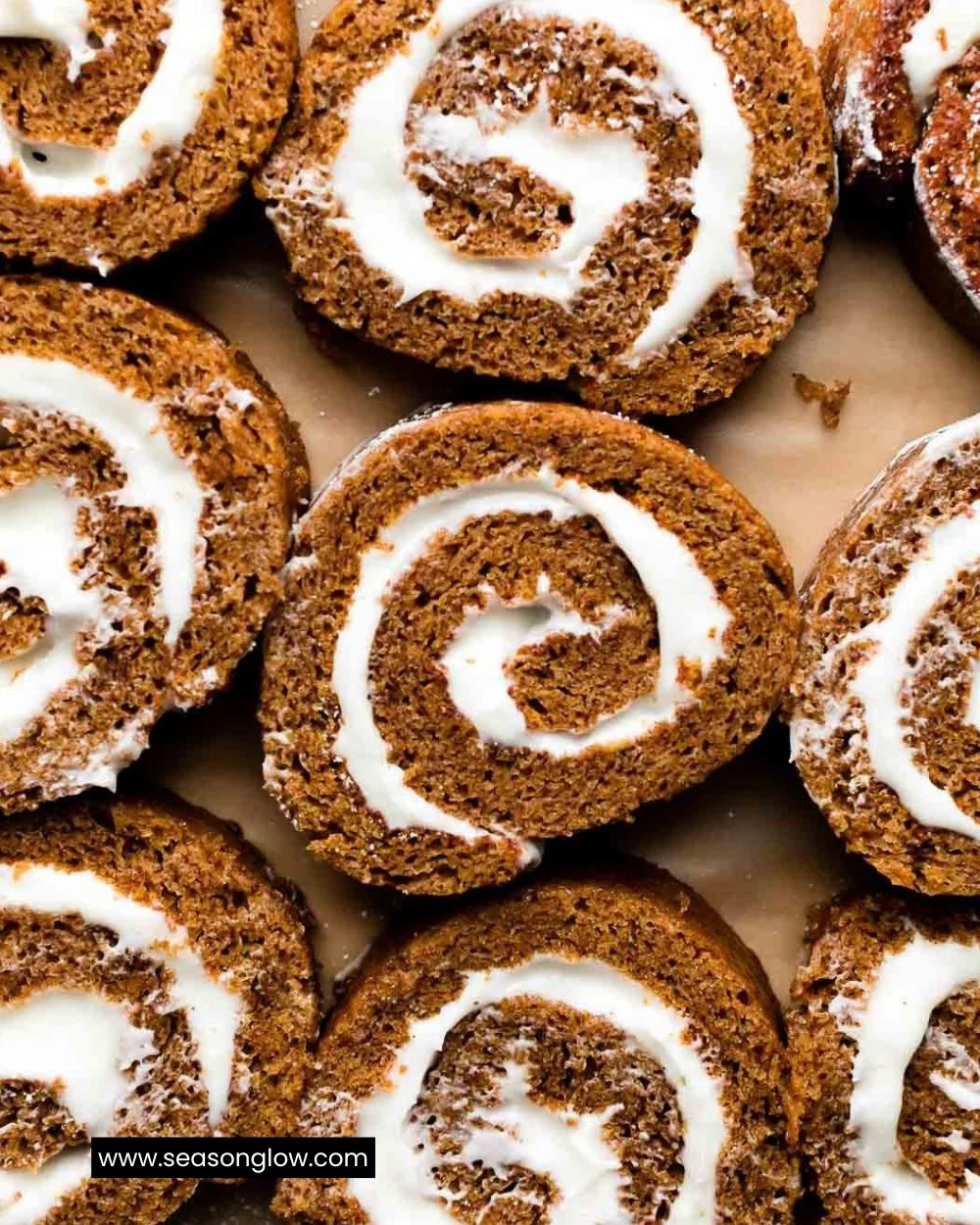 A beautifully rolled pumpkin dessert with cream cheese filling.