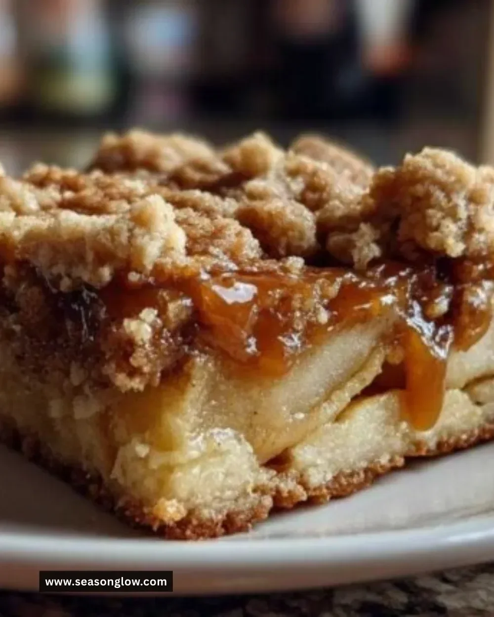 Delicious Salted Caramel Apple Crumble Bars baked to perfection.