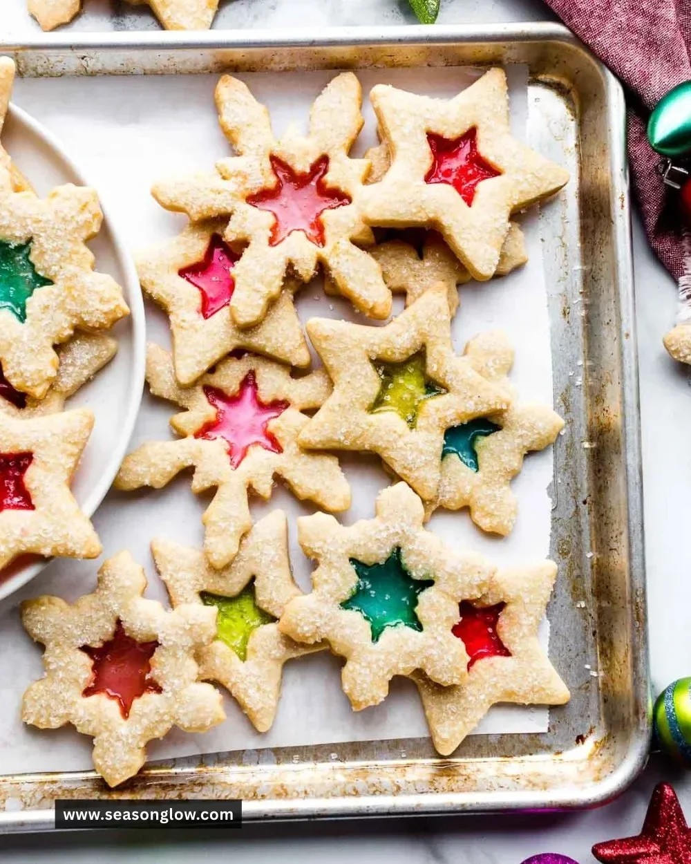 Colorful stained glass window cookies decorated with vibrant sugars