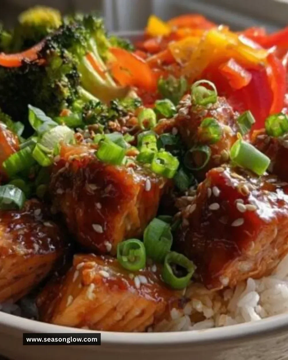 Delicious 20-minute teriyaki salmon bowls garnished with vegetables and rice