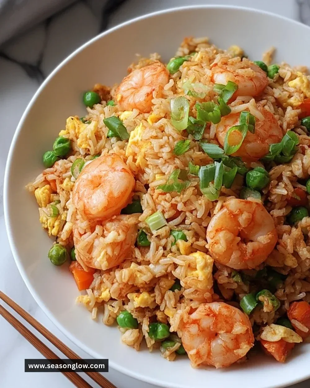 30-minute shrimp fried rice with colorful vegetables in a pan