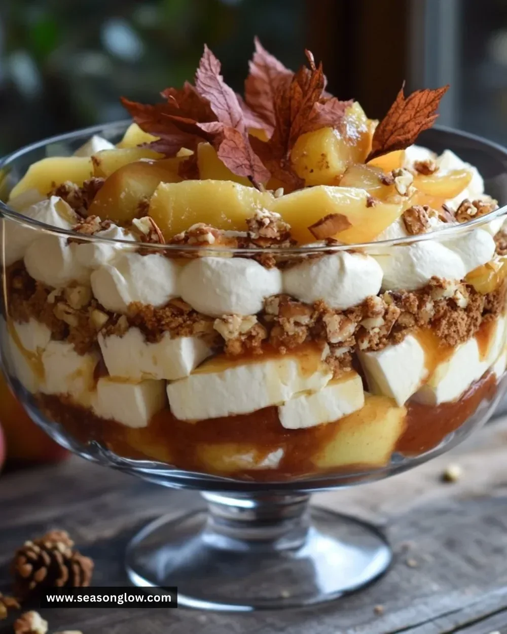 Delicious baked apple caramel trifle with speculoos layers and whipped cream