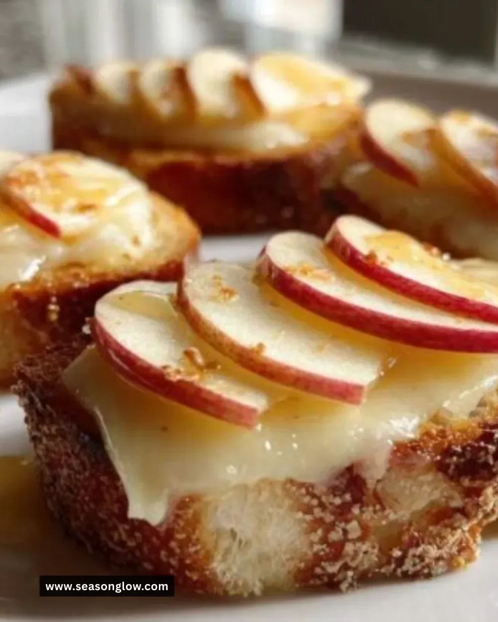 Brie Apple Crostini with sliced apples on toasted baguette