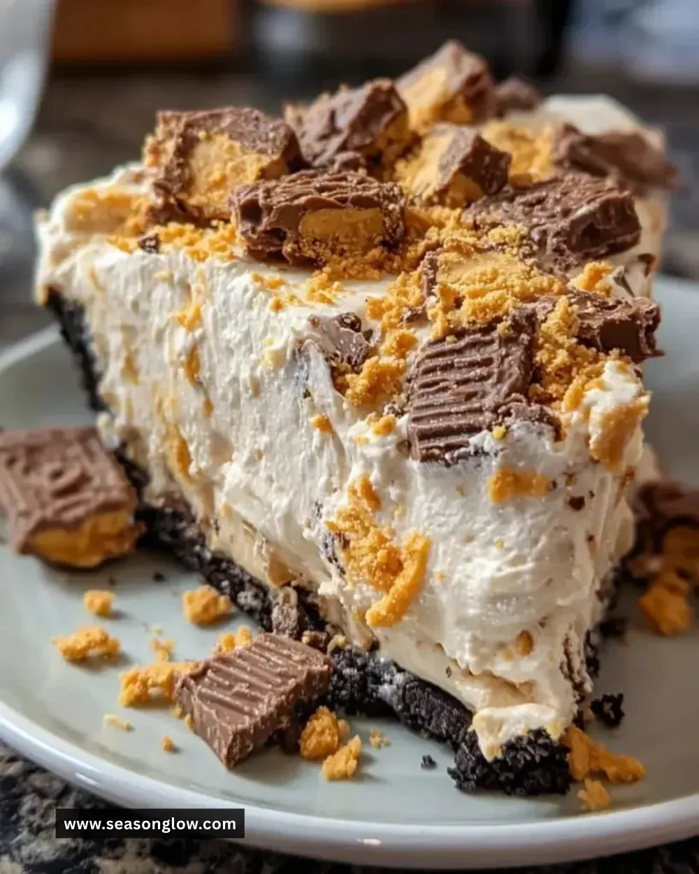 Delicious Butterfinger Peanut Butter Pie topped with crushed Butterfinger candies