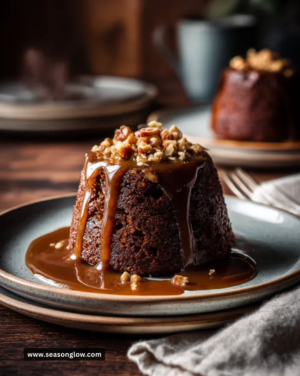 Delicious chocolate sticky toffee pudding served in two ramekins.