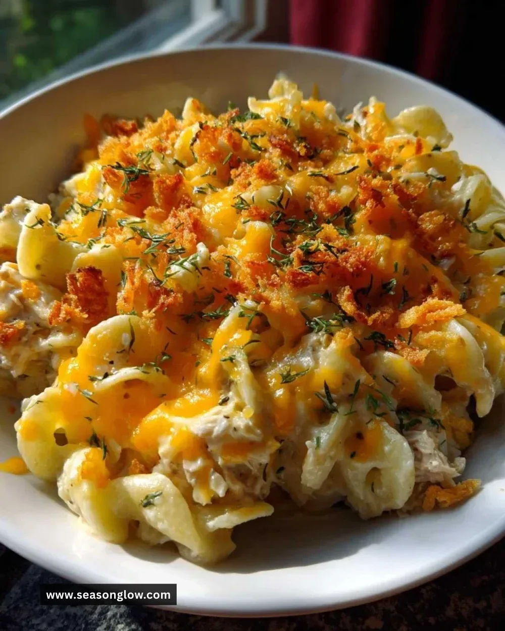 Delicious homemade classic tuna noodle casserole served in a baking dish.