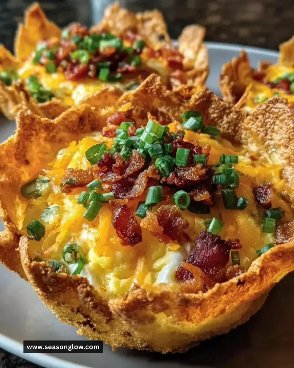 Crunchy tortilla breakfast cups filled with eggs and vegetables
