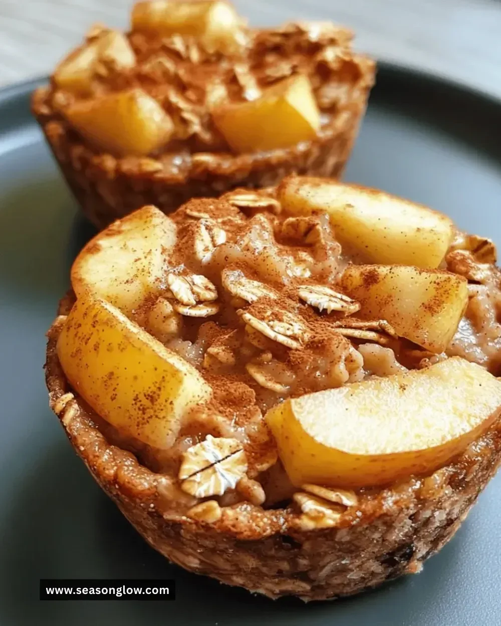 Delicious apple cinnamon oatmeal cups in a baking tray, ready to serve.