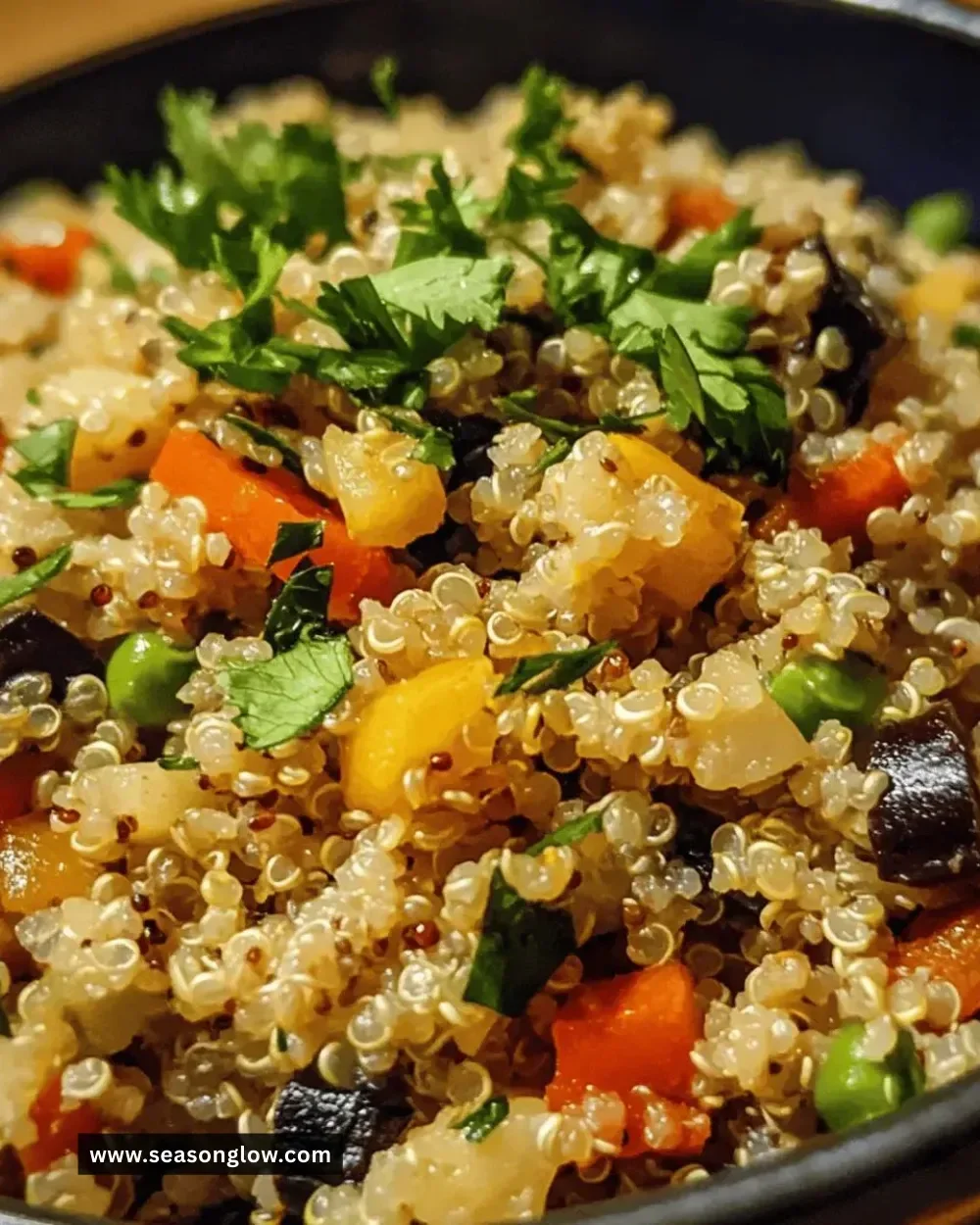 Bowl of easy gluten-free quinoa and vegetable pilaf, fresh and colorful meal.