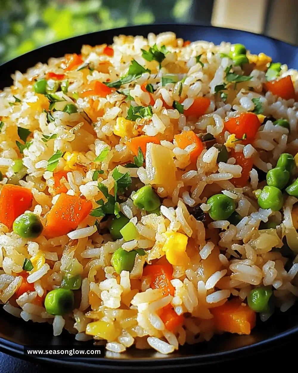 Bowl of easy quick veggie fried rice with colorful vegetables and herbs
