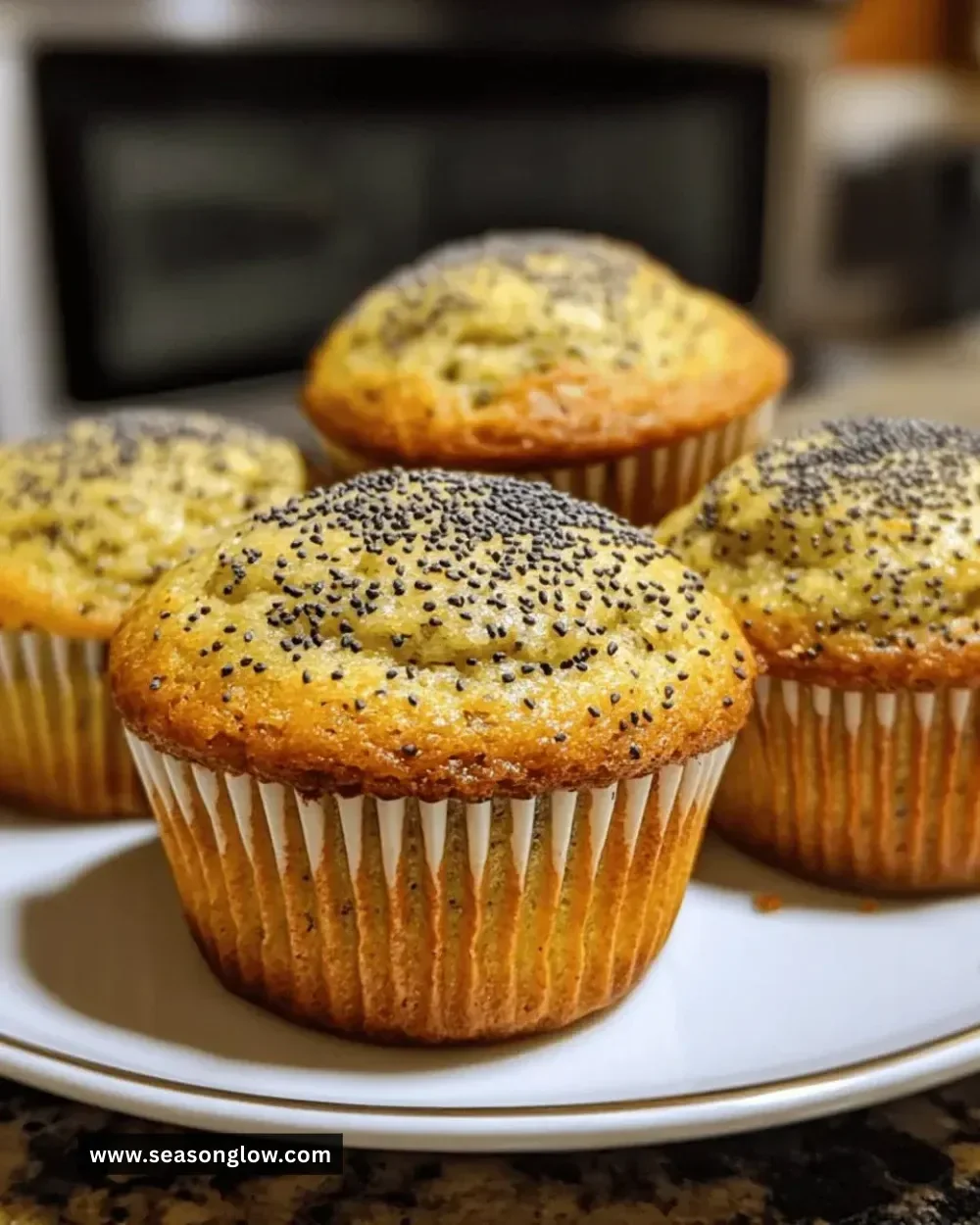 Easy vegan lemon poppy seed muffins baked in a tray