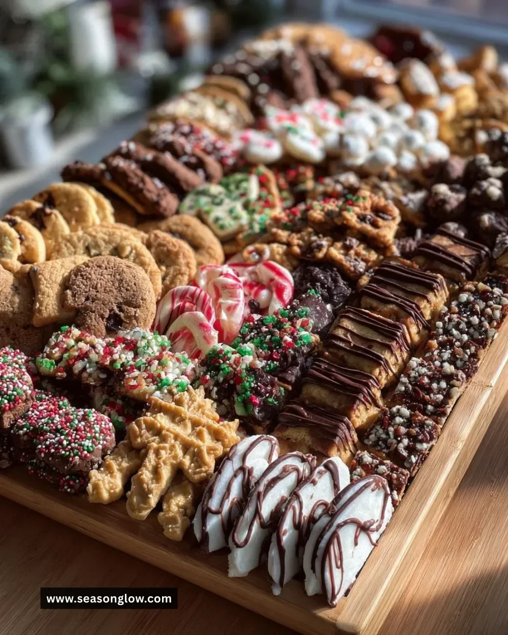 Festive Christmas cookie charcuterie board with assorted colorful cookies