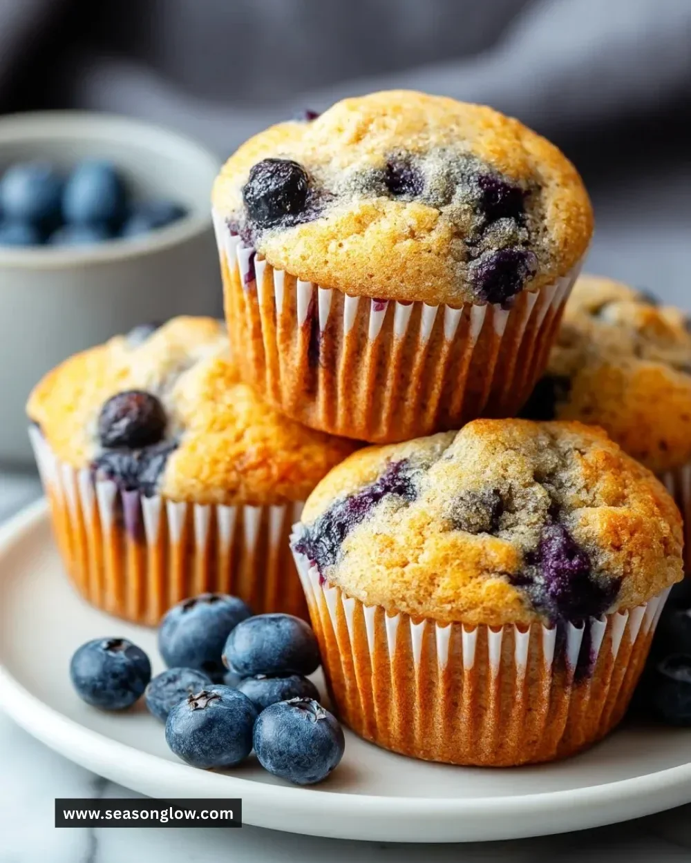 Delicious gluten-free blueberry muffins freshly baked in a muffin tray