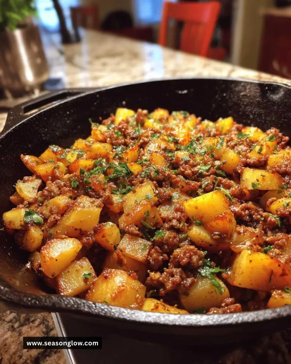 Savory ground beef and potato hash served in a skillet
