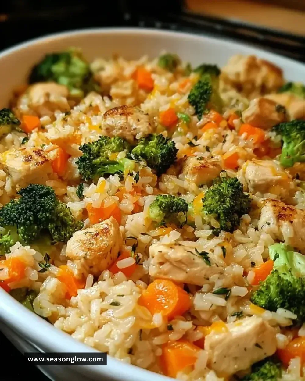 Healthy chicken and rice casserole dish topped with fresh herbs